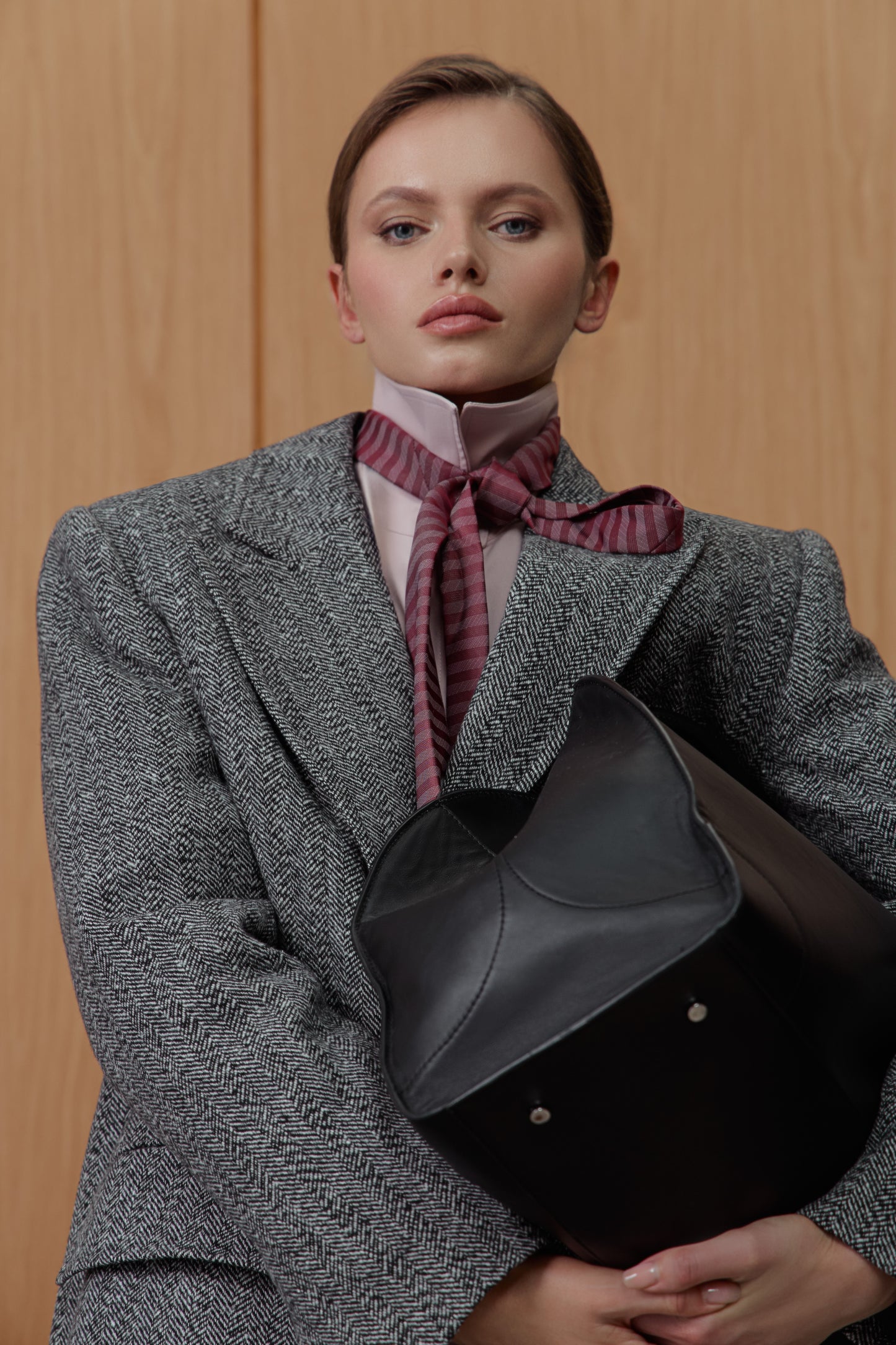 Insulated coat in black and white houndstooth print