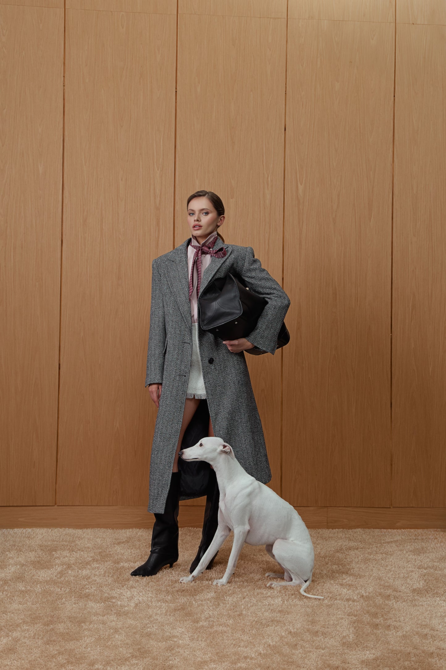 Insulated coat in black and white houndstooth print