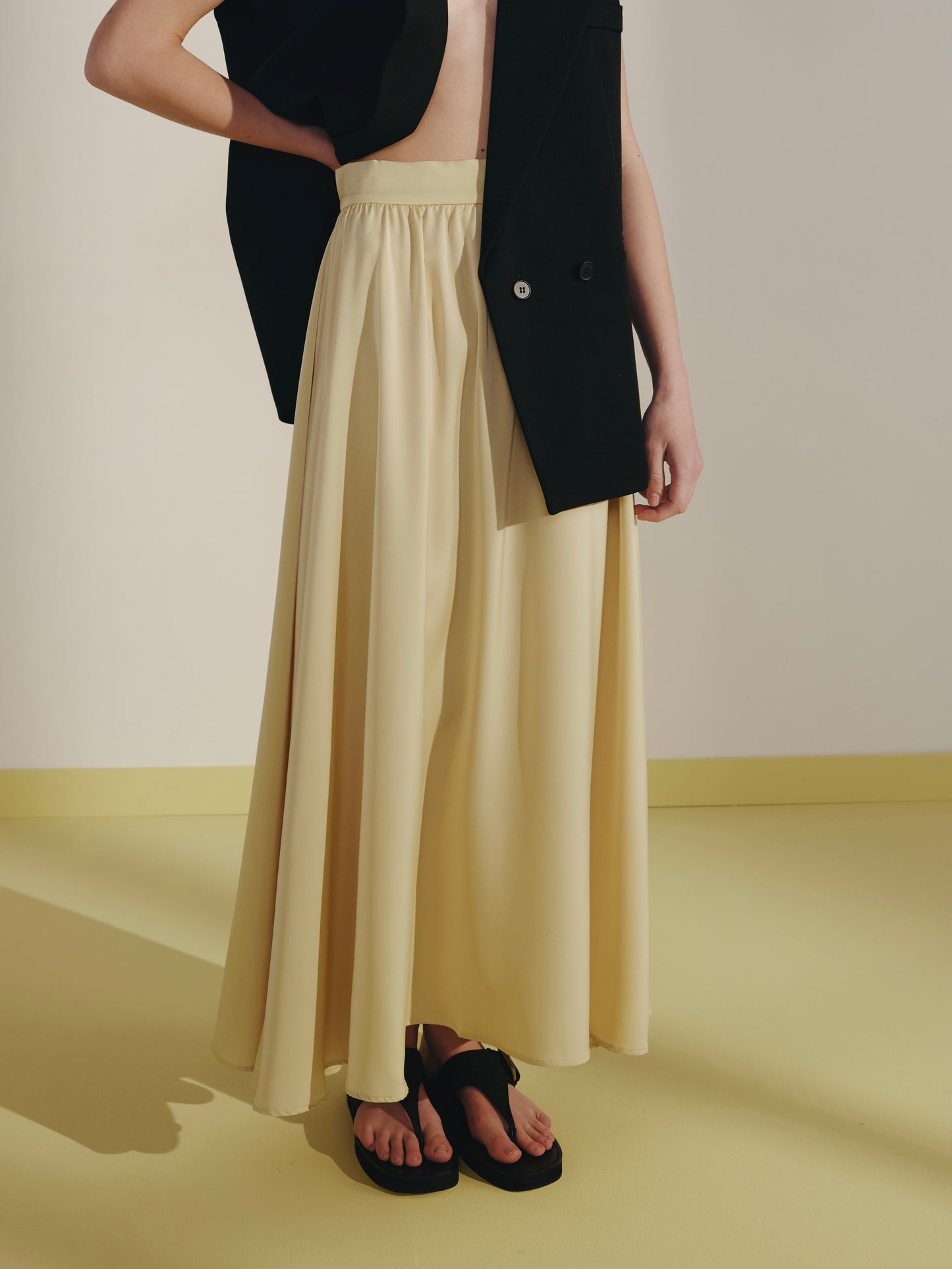 Yellow satin flared skirt