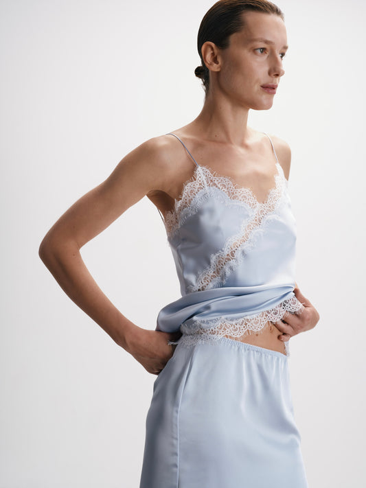 Сатиновий блакитний подовжений топ з мереживом