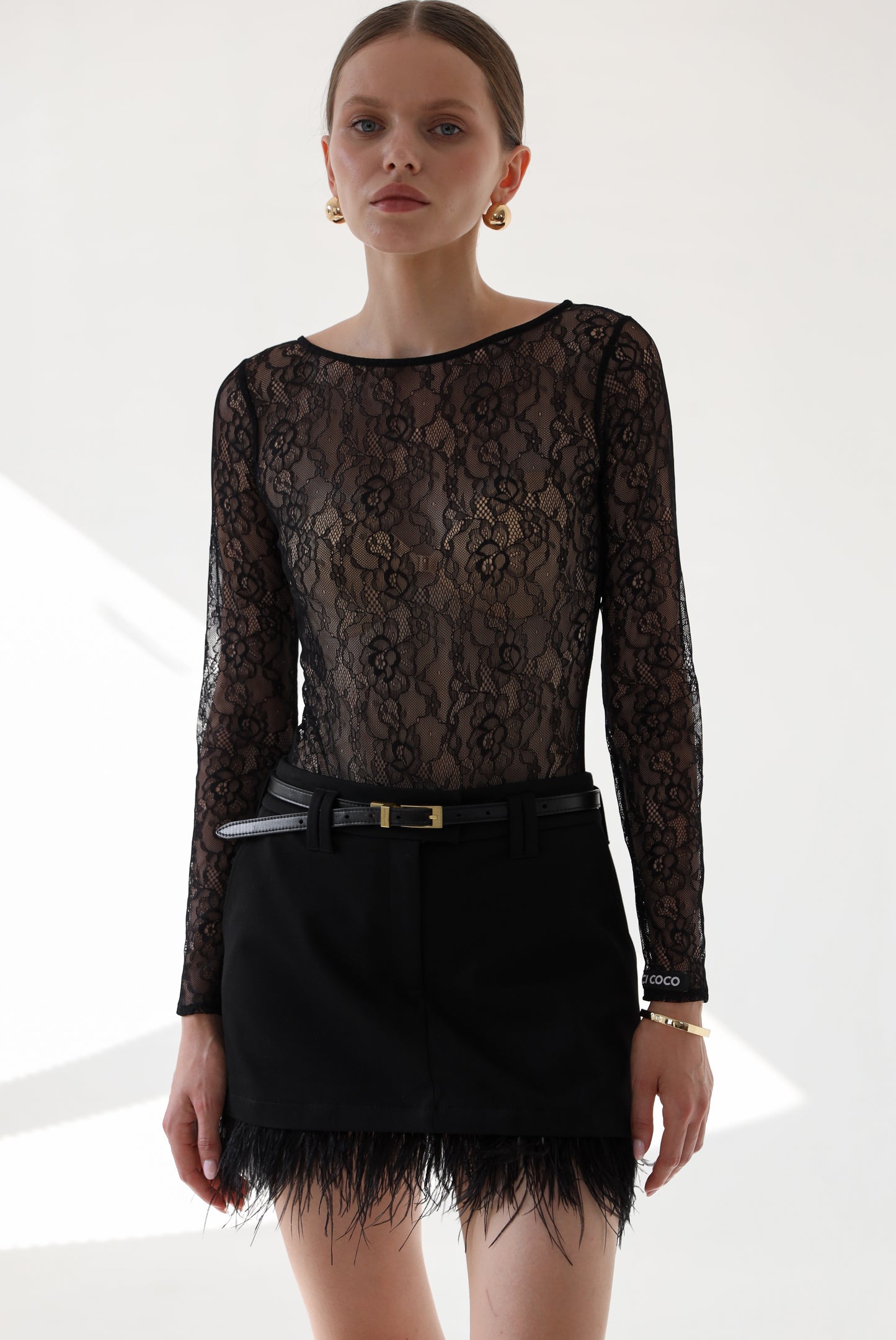 Спідниця міні з відстібним пір'ям чорна