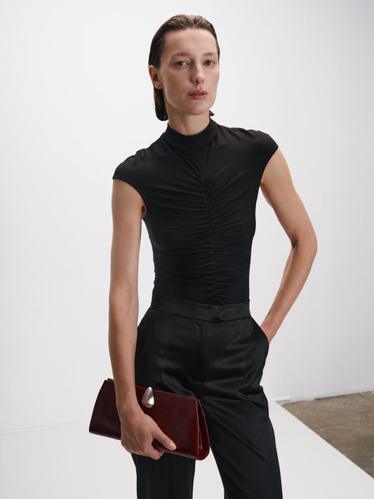Чорне боді з акцентним драпіруванням