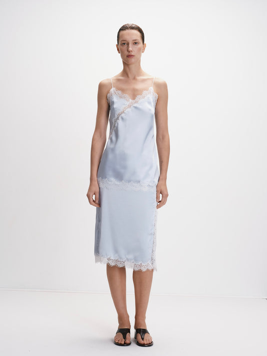 Сатинова блакитна спідниця з мереживом