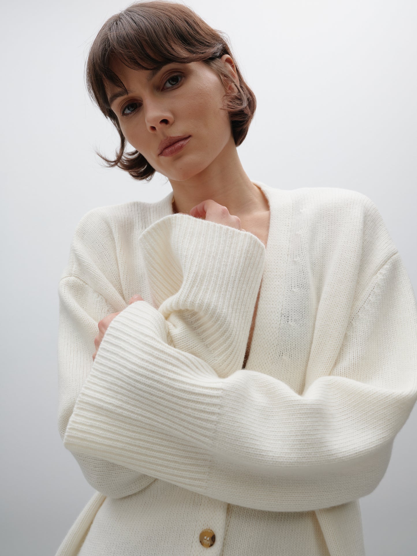 Кардиган вовняний молочний з гудзиками