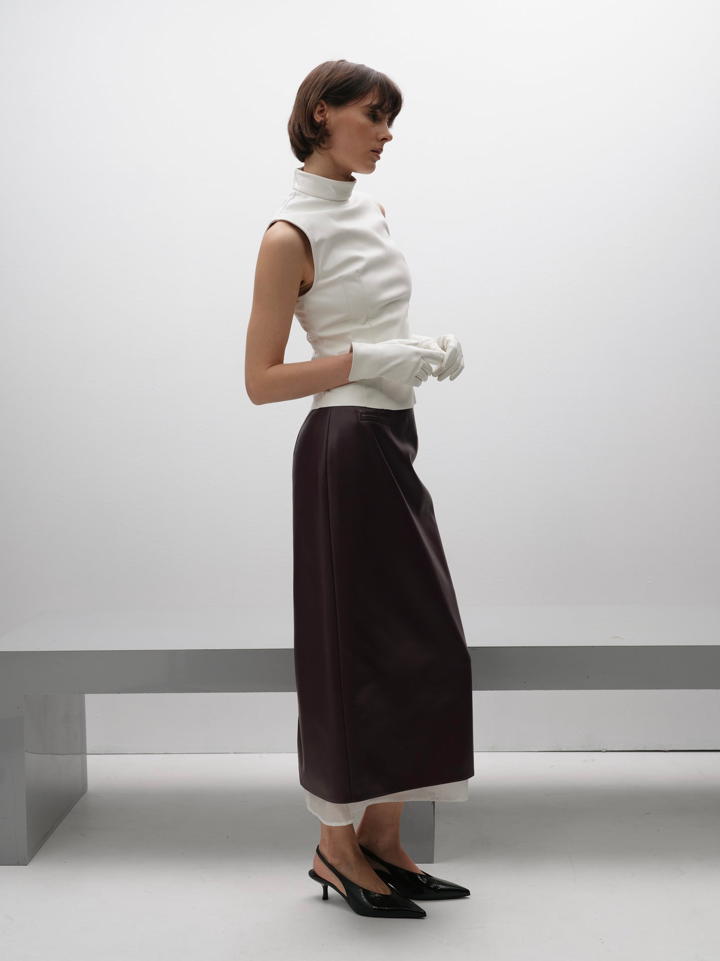 Гольф без рукавів еко-шкіра молочний