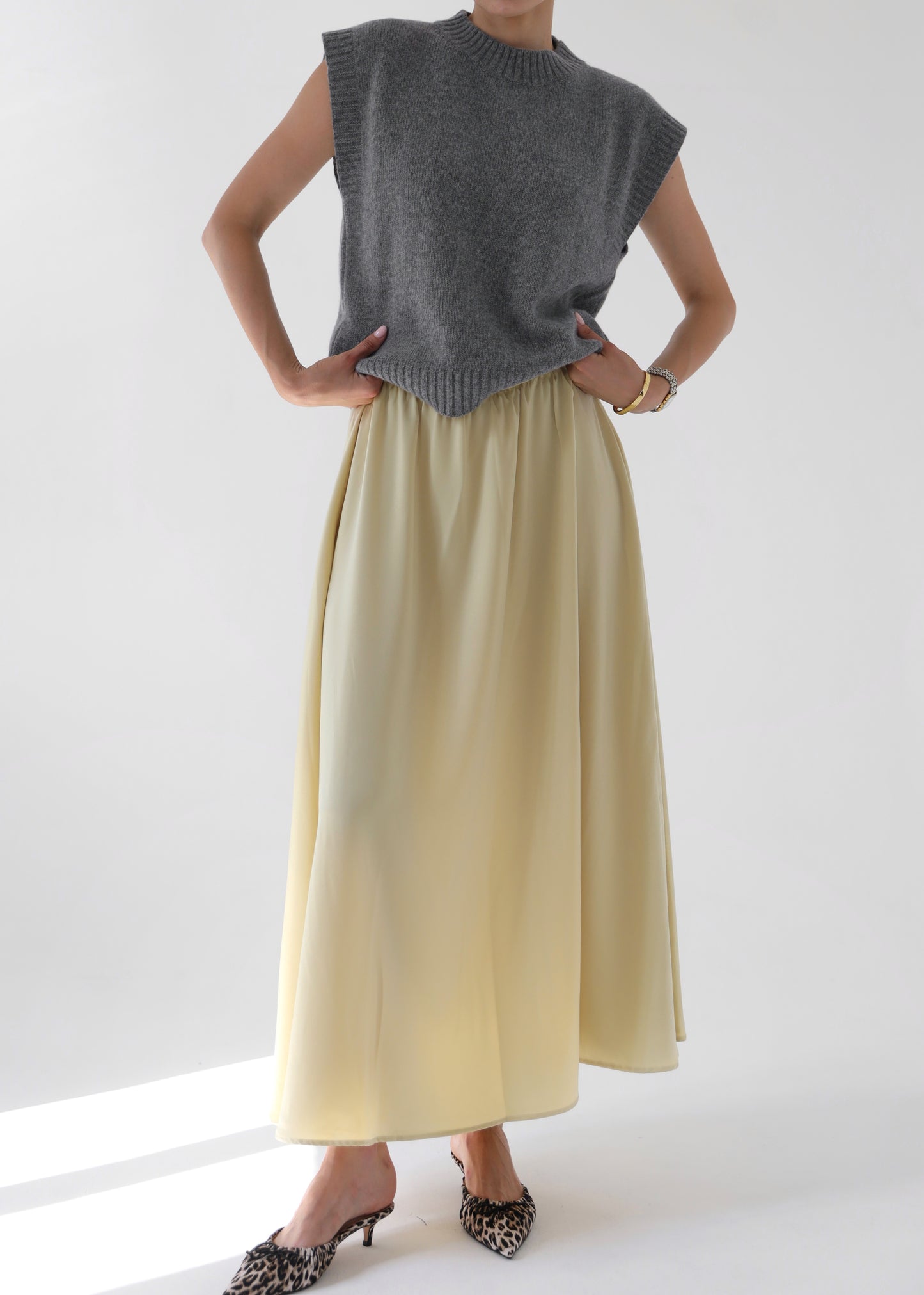 Yellow satin flared skirt