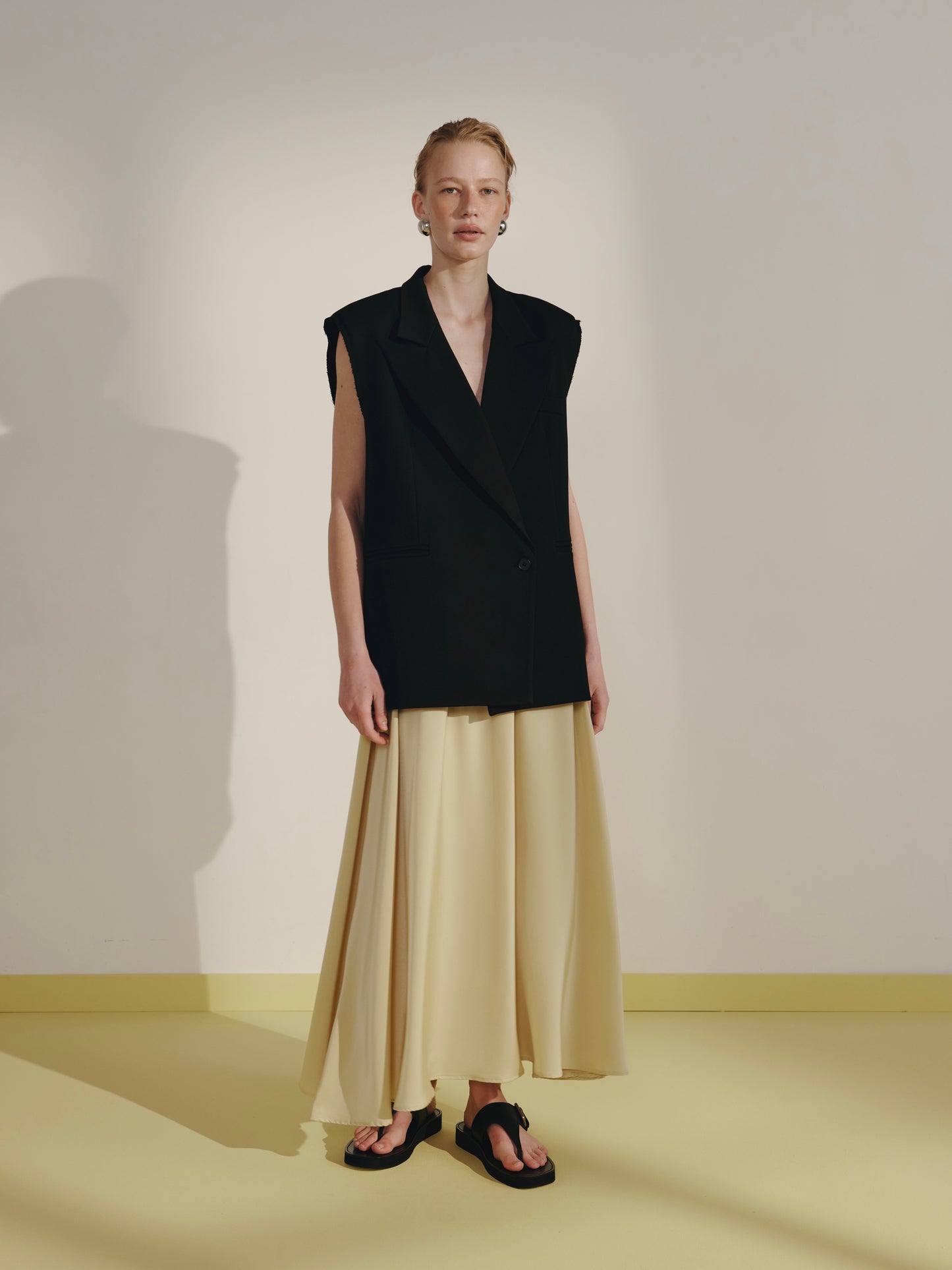 Yellow satin flared skirt