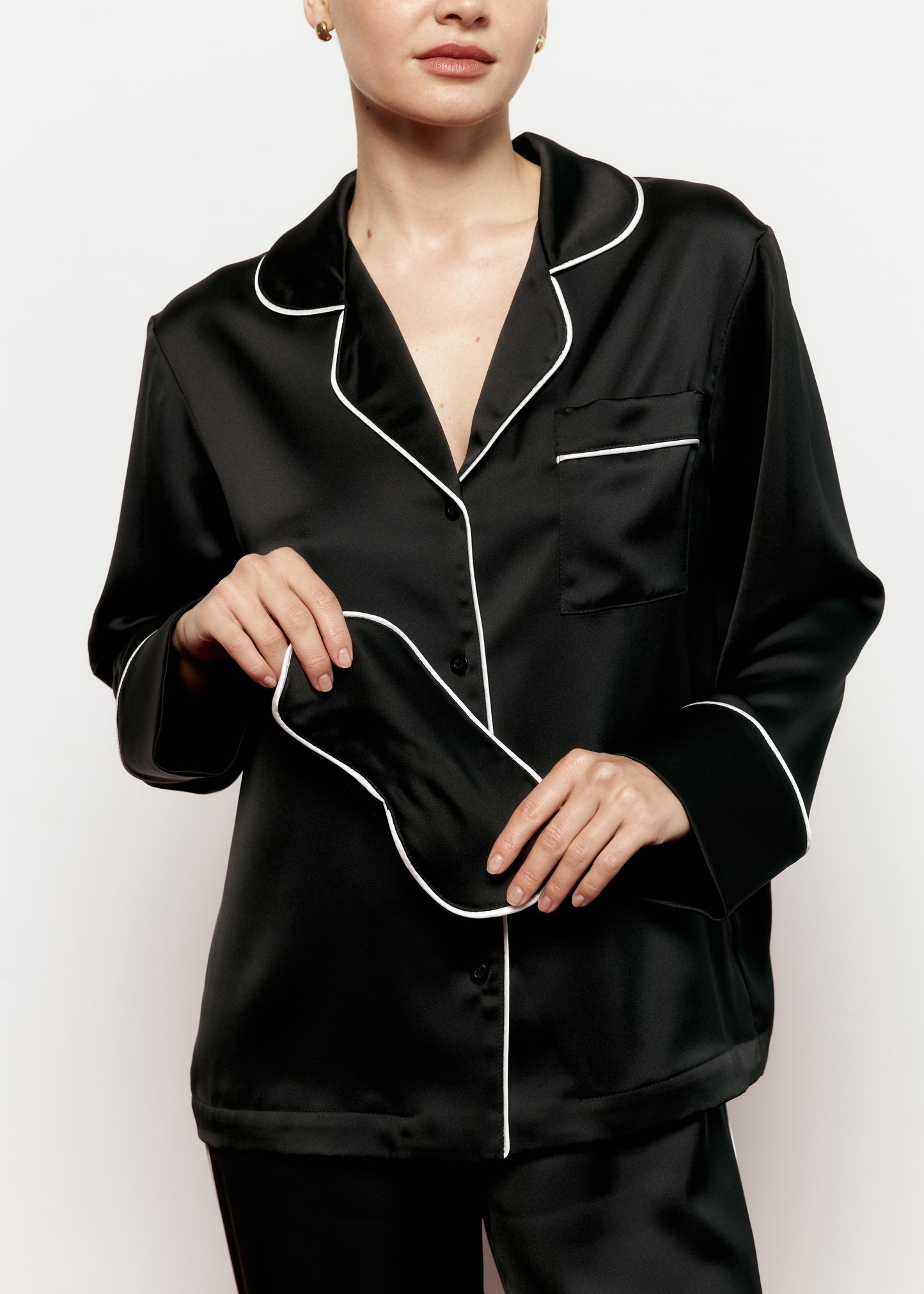 Black satin pajamas with contrasting piping