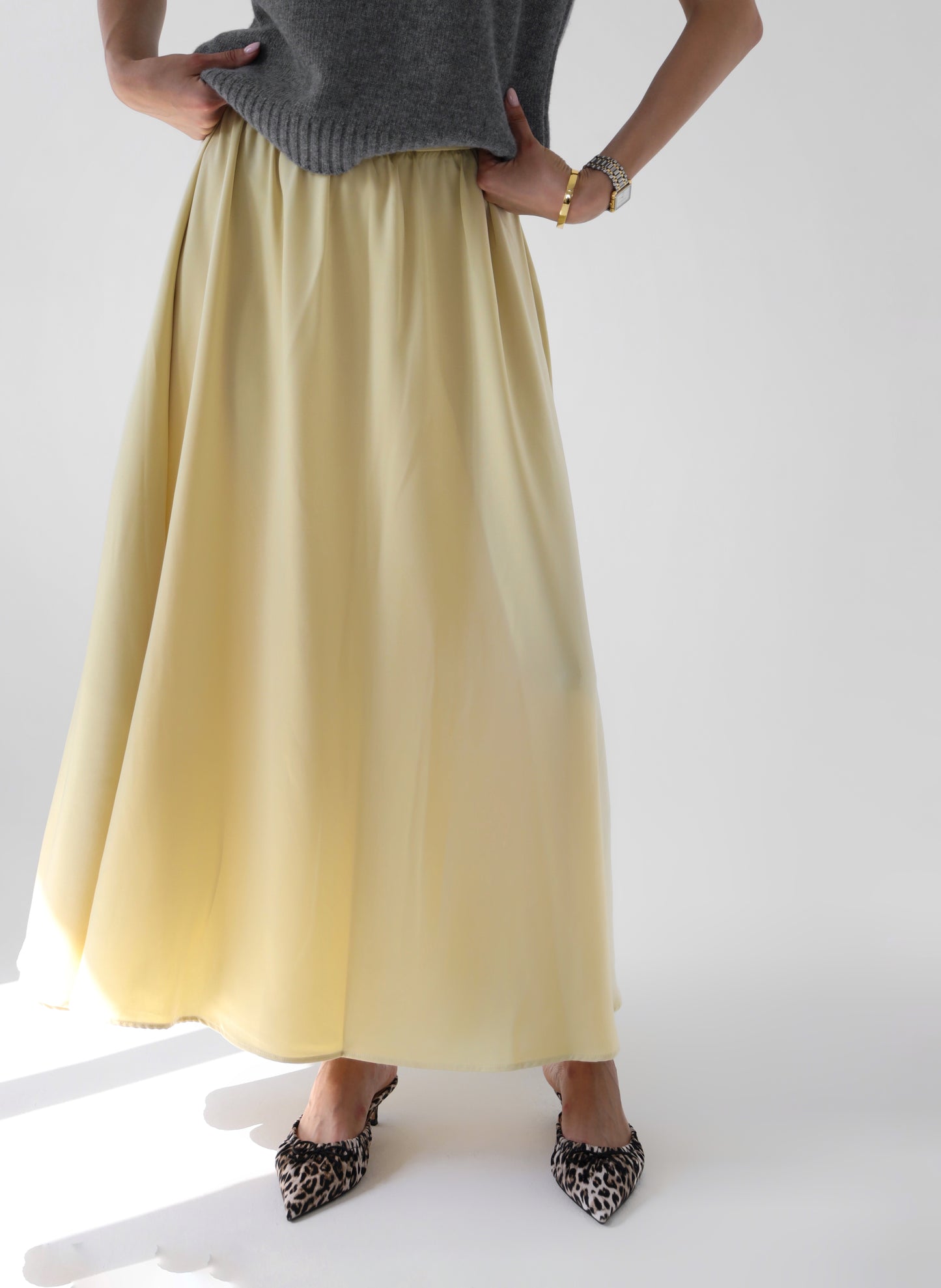 Yellow satin flared skirt