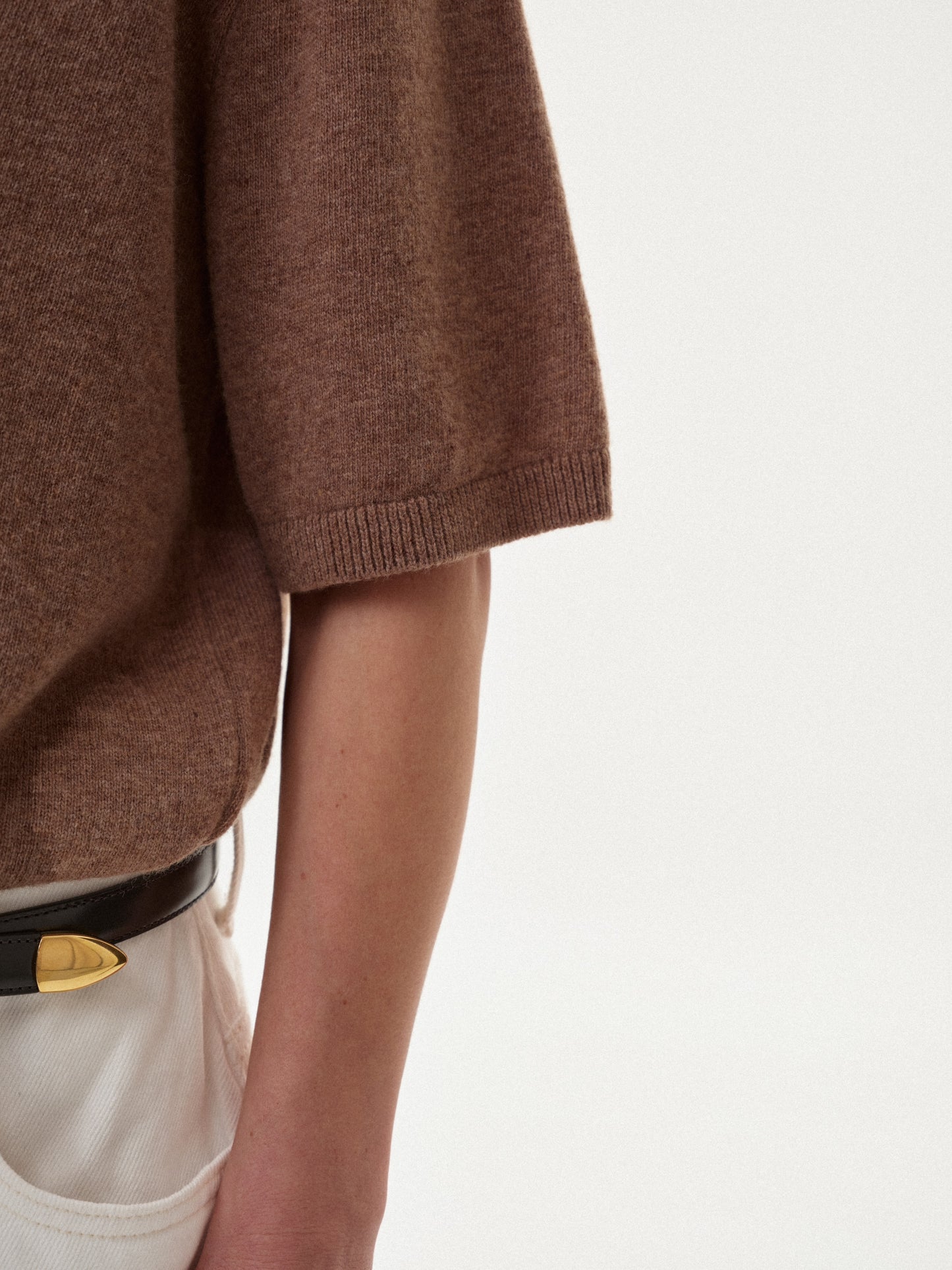 В'язане бежеве поло на короткий рукав